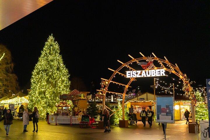 Portrait walk under the Christmas market lights