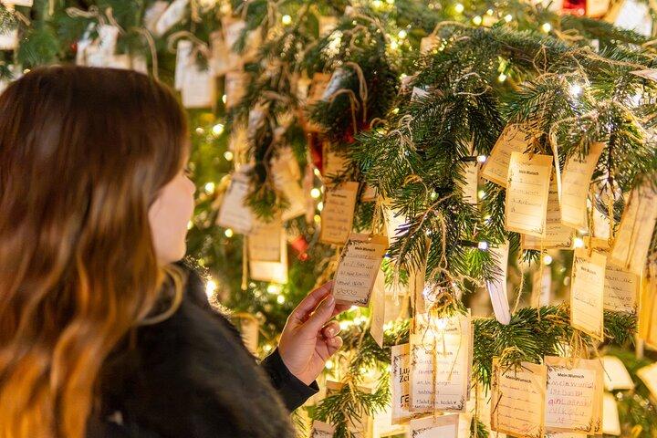 Guest browsing the Christmas market stalls